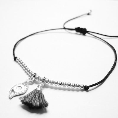 Pulsera Balls Plata Ojito Borla Gris Hilo Negro